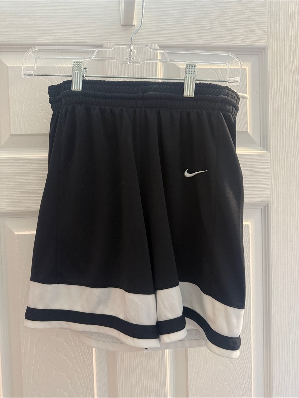 Nike boy’s Black Athletic Shorts with White Hem